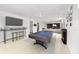 Finished basement with pool table, bar seating, and cozy fireplace lounge at 12024 W Maryland Dr, Lakewood, CO 80228