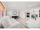 Spacious living room featuring neutral walls, wood flooring, an open floor plan at 12024 W Maryland Dr, Lakewood, CO 80228