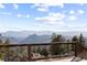 Breathtaking mountain vistas viewed from the home's deck, perfect for enjoying the beauty of nature at 18645 Rocky Top Trl, Littleton, CO 80127
