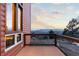 Lovely deck area offering scenic views of the surrounding area and beautiful panels at 18645 Rocky Top Trl, Littleton, CO 80127