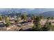 Charming mountain home featuring stunning panoramic views of the surrounding landscape at 18645 Rocky Top Trl, Littleton, CO 80127
