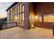 Exterior view of lovely home with wooden panels, ample natural lighting, and a deck at 18645 Rocky Top Trl, Littleton, CO 80127