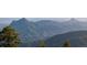 Scenic view of a majestic mountain range at 18645 Rocky Top Trl, Littleton, CO 80127