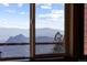 Breathtaking mountain view framed by a window with mountain views at 18645 Rocky Top Trl, Littleton, CO 80127