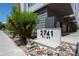 Charming townhome address featuring landscaping, rocks and green foliage; the address '2741' is prominently displayed at 2741 W 28Th Ave # 2, Denver, CO 80211