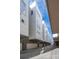 Modern townhome exterior showcasing sleek architectural design and private garage entrances at 2741 W 28Th Ave # 2, Denver, CO 80211