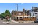 Charming restaurant exterior with outdoor seating, brick facade, and inviting ambiance for a delightful dining experience at 2741 W 28Th Ave # 2, Denver, CO 80211