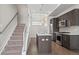 Modern kitchen boasts stainless appliances, center island, and sleek cabinets, ideal for cooking at 2741 W 28Th Ave # 2, Denver, CO 80211
