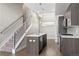 Modern kitchen boasts stainless appliances, center island, and sleek cabinets, ideal for cooking at 2741 W 28Th Ave # 2, Denver, CO 80211