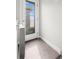 Landing featuring natural light streaming through a glass paneled door, with carpeted floor, and white trim at 2741 W 28Th Ave # 2, Denver, CO 80211