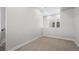 Bedroom with neutral carpet and a bright window at 2741 W 28Th Ave # 2, Denver, CO 80211