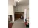 Unfinished basement with double sink, cabinets, and a refrigerator at 3839 E 135Th Way, Thornton, CO 80241