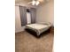Cozy bedroom with a ceiling fan, window with blinds, and neutral-toned carpet at 3839 E 135Th Way, Thornton, CO 80241
