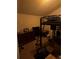 Bedroom with a bunk bed, a dresser, and a window with natural light at 3839 E 135Th Way, Thornton, CO 80241