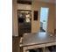 Spacious kitchen featuring stainless steel appliances, ample storage, and a functional island at 3839 E 135Th Way, Thornton, CO 80241