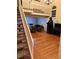 Open-concept living room featuring hardwood floors, high ceilings, and unique decor at 3839 E 135Th Way, Thornton, CO 80241