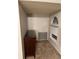 Small office space with dark cabinet and a window at 3839 E 135Th Way, Thornton, CO 80241