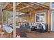 Relaxing outdoor living space with comfortable seating and views at 10896 Timothys Dr, Conifer, CO 80433