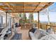 Deck with an outdoor seating area, heater, grill, dining area, and mountain views at 10896 Timothys Dr, Conifer, CO 80433