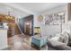 Inviting living room area with wood accents, large window, and stylish decor at 10896 Timothys Dr, Conifer, CO 80433