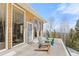 Exterior patio with two adirondack chairs and views of the surrounding mountains at 10896 Timothys Dr, Conifer, CO 80433