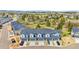 A masterfully designed townhouse complex, boasting a combination of blue and gray exterior paint at 749 Bishop Pine Way, Castle Rock, CO 80104