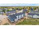 A set of attractive townhouses, showcasing the gray and blue exterior paint at 749 Bishop Pine Way, Castle Rock, CO 80104