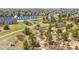 An attractive neighborhood, dotted with tree-lined pathways and an inviting pedestrian bridge at 749 Bishop Pine Way, Castle Rock, CO 80104