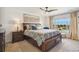 Spacious bedroom with a large bed and ample natural light at 749 Bishop Pine Way, Castle Rock, CO 80104