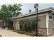 Exterior view of clubhouse with well-maintained landscaping at 749 Bishop Pine Way, Castle Rock, CO 80104