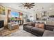 Spacious open-concept living room and kitchen featuring hardwood floors and recessed lighting at 749 Bishop Pine Way, Castle Rock, CO 80104