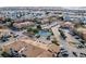 Aerial view of a well-maintained community, featuring a tennis court and ample parking at 430 Zang St # 4-301, Lakewood, CO 80228