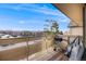 Balcony with a grill and a view of the mountains and clear blue skies at 430 Zang St # 4-301, Lakewood, CO 80228