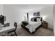 Cozy bedroom featuring a black and white theme, carpet, and a relaxing atmosphere at 430 Zang St # 4-301, Lakewood, CO 80228