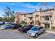 Exterior view of building with reserved parking in front at 430 Zang St # 4-301, Lakewood, CO 80228