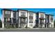 Modern townhome featuring a stylish facade and inviting entrance at 634 Saddle Dr, Erie, CO 80516