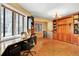 Flex room with built-in shelving and a Murphy bed for a dual-purpose space at 9164 E Lost Hill Trl, Lone Tree, CO 80124