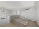 Bright loft space with large windows and a neutral color palette at 2101 S Victor St # C, Aurora, CO 80014