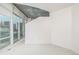 This bedroom features natural light and large windows with city views at 891 14Th St # 1506, Denver, CO 80202