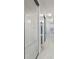 This hallway features sliding mirrored closet doors and recessed lighting at 891 14Th St # 1506, Denver, CO 80202