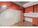 This office features hardwood floors, red storage cabinets and a built-in desk at 891 14Th St # 1506, Denver, CO 80202