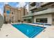Inviting outdoor pool area with comfortable lounge chairs and city views at 891 14Th St # 1506, Denver, CO 80202