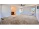 Spacious bedroom with large windows, ceiling fan and attached bathroom at 2446 S Vaughn Way # A, Aurora, CO 80014