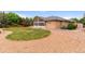 Expansive backyard featuring well-maintained lawn, stone landscaping and sunroom, perfect for relaxation and outdoor activities at 3806 S Dawson St, Aurora, CO 80014