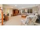 Finished basement with a seating area, plenty of light, wood accents and plush carpet at 3806 S Dawson St, Aurora, CO 80014