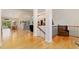 Bright living room with hardwood floors, lots of natural light, and vaulted ceilings at 3806 S Dawson St, Aurora, CO 80014