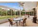 Sun room with ceiling fans, glass paneled walls, tile flooring and outdoor views at 3806 S Dawson St, Aurora, CO 80014
