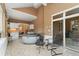 Bright sunroom with a hot tub, tiled floors, large windows, and plenty of space for entertaining at 3806 S Dawson St, Aurora, CO 80014