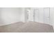 Bedroom featuring soft carpet and closet doors at 1519 S Sable Blvd # C, Aurora, CO 80012