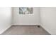 Cozy bedroom featuring soft neutral carpet and a window with natural sunlight at 1519 S Sable Blvd # C, Aurora, CO 80012